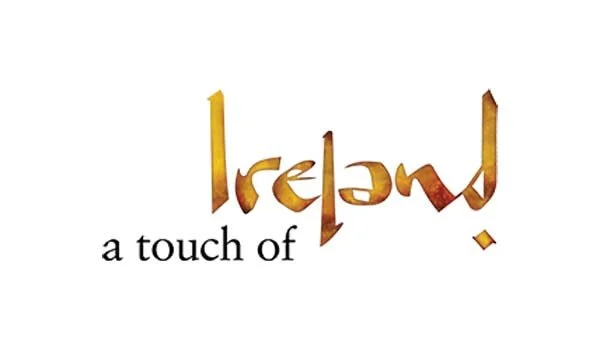 "A touch of Ireland" text logo with stylized typography on a white background.