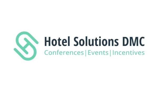 Logo for Hotel Solutions DMC, featuring a stylized green emblem and text describing services: Conferences, Events, Incentives.