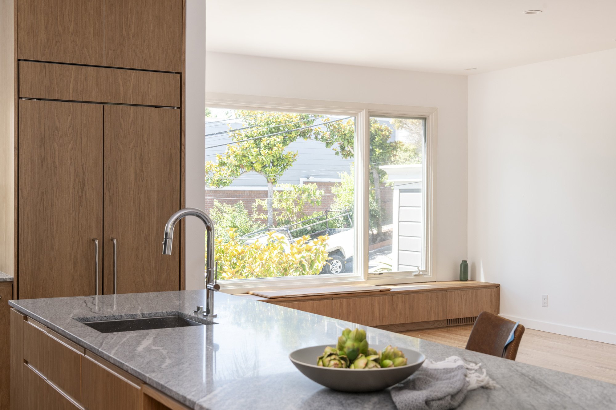 San Francisco kitchen renovation by YW Builders featuring expansive windows, abundant natural light, thoughtful design, and quality craftsmanship throughout.