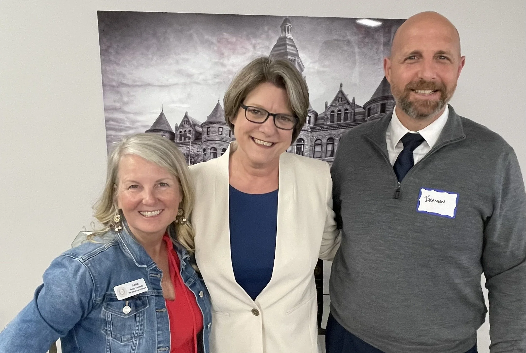 Stephanie Hudson with Justice Nancy Kennedy and Judge Brandon Birmingham.