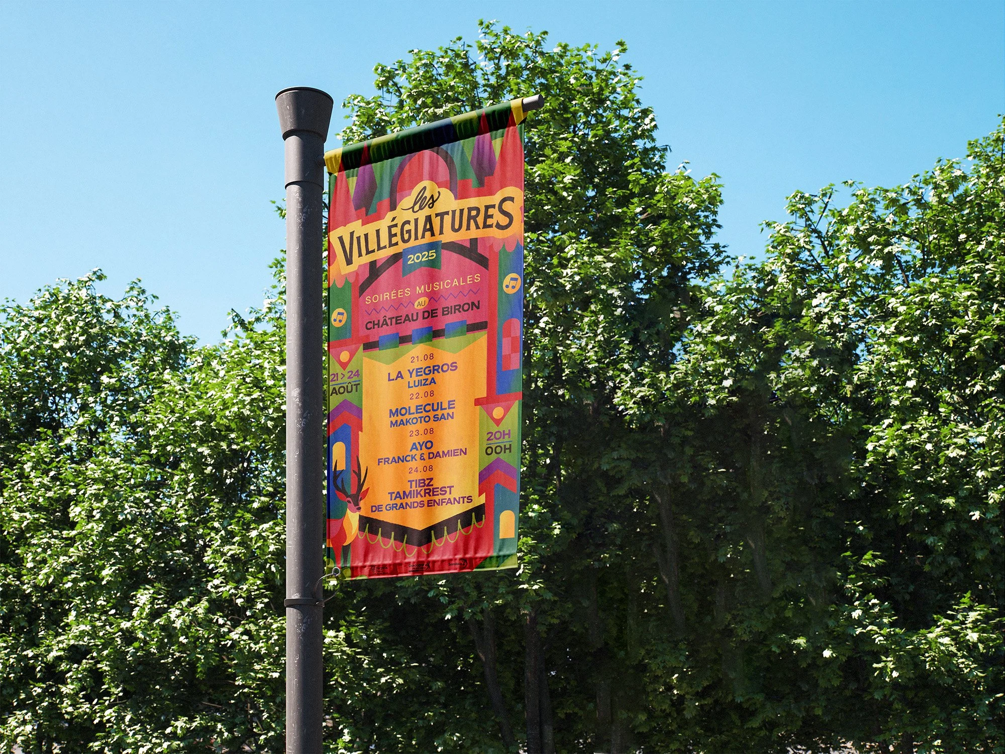 Colorful vertical banner advertising in French for the 2025 Villégiatures event at Château de Biron, with dates from August 21 to August 24, 2025, featuring musical performances, against a backdrop of green trees and a clear blue sky.