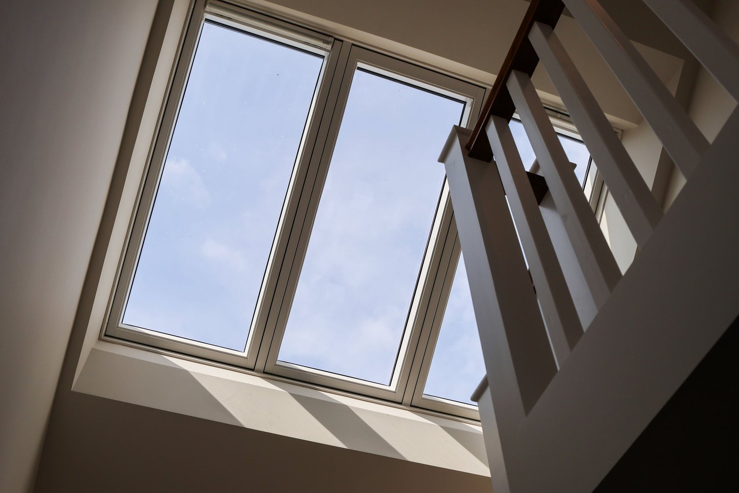 Modern home renovation with feature skylights above staircase by RC-Builders Ltd Devon