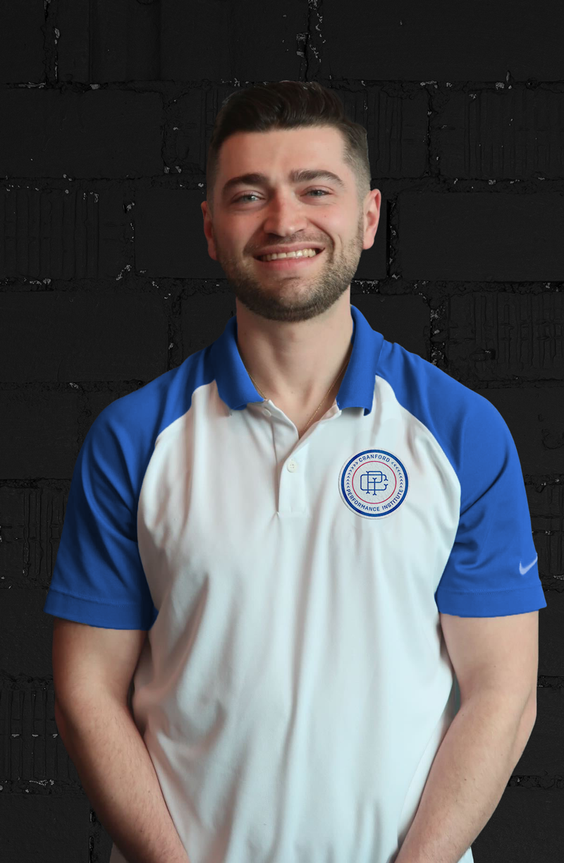 A generic user icon with a circular head and oval shoulders on a gray background.