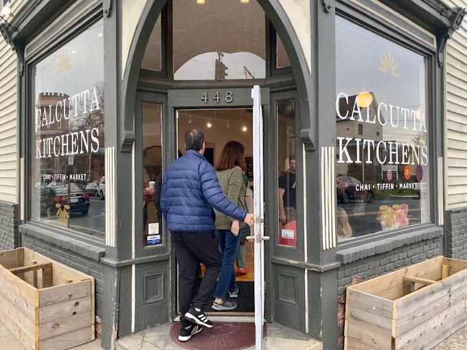 couple walking in to Calcutta Kitchens