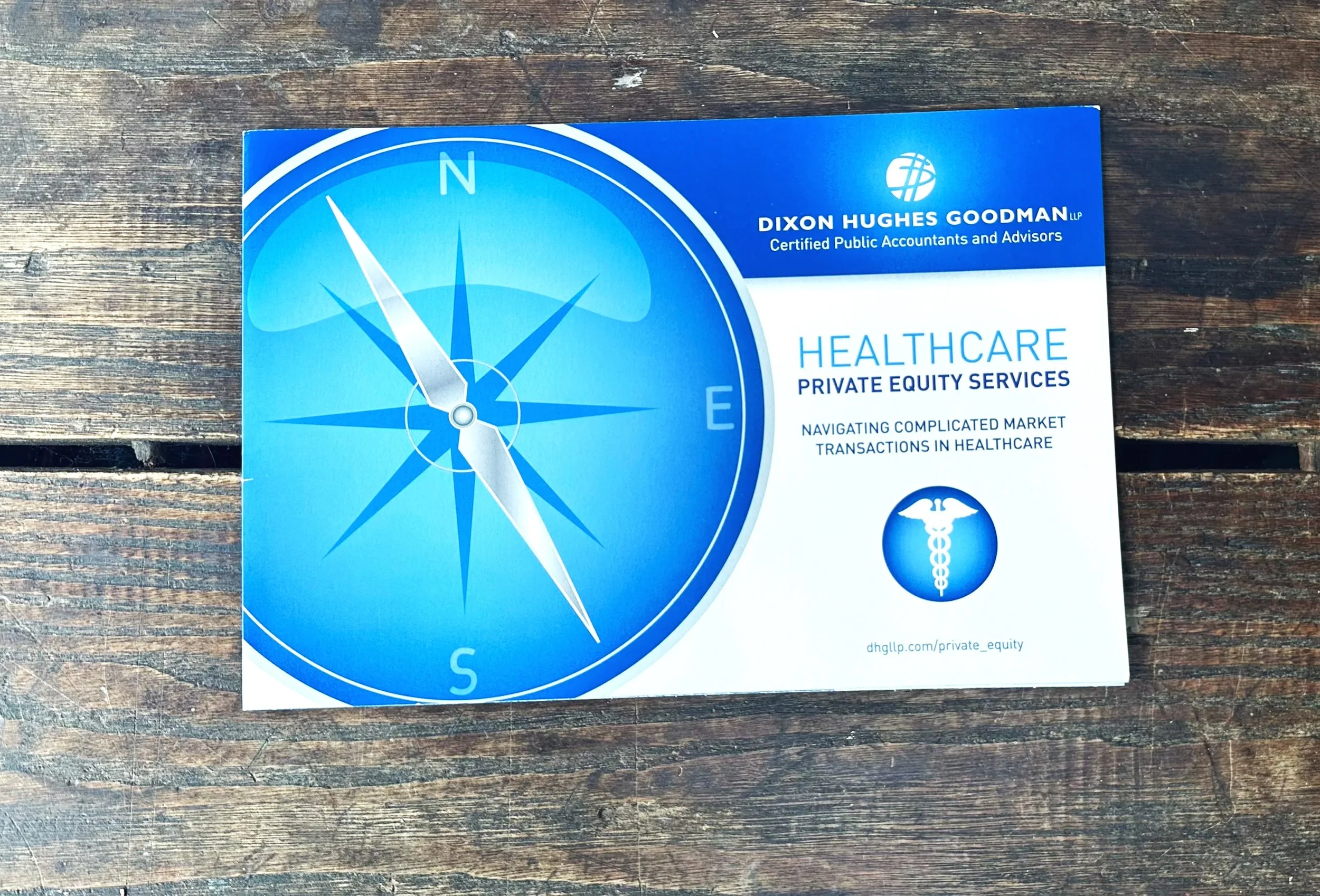 Brochure with a compass pointing north, promoting healthcare private equity services by Dixon Hughes Goodman, with a medical symbol and website URL.