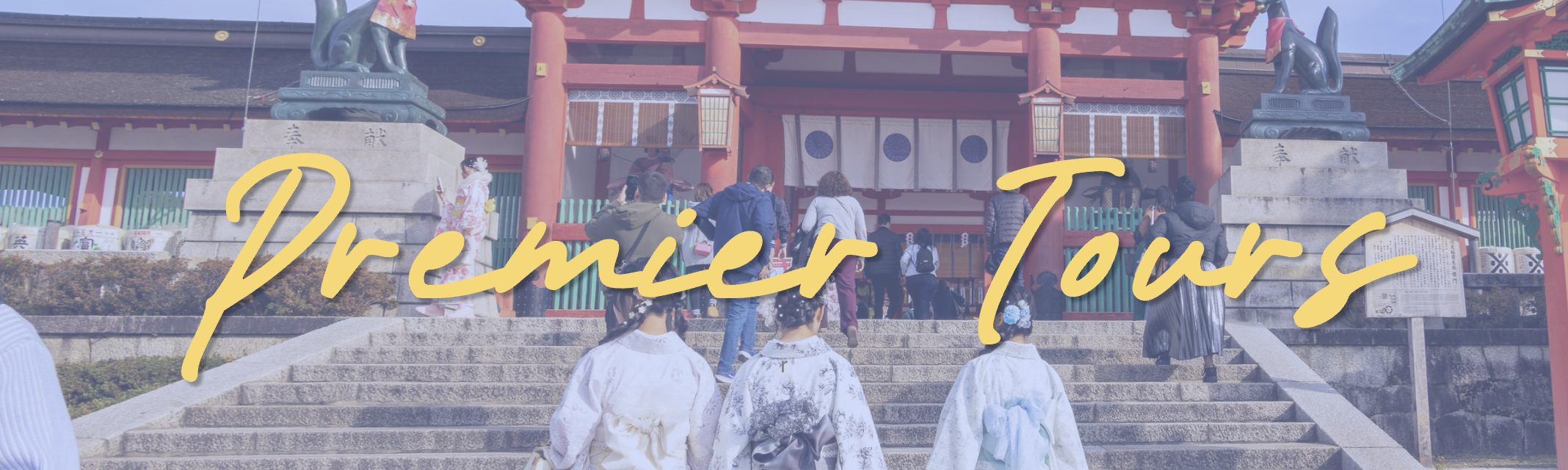People entering a traditional Japanese shrine with red torii gate and stone lanterns, some women dressed in kimonos