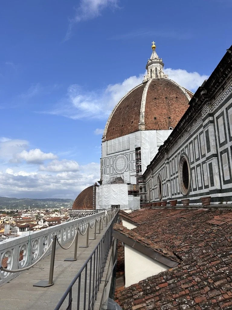 The Florence Duomo up close against a blue sky