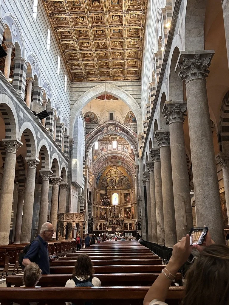Marble columns and mosaics inside the cathedral in Pisa