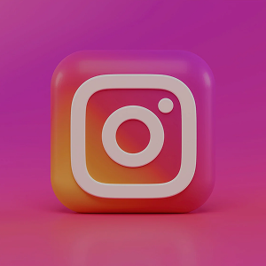 Instagram logo on a pink gradient background.