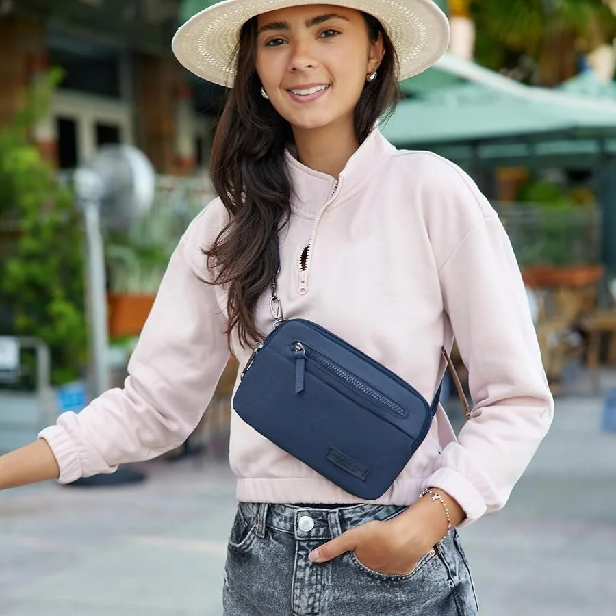 Woman sightseeing with a Travelon anti theft crossbody bag