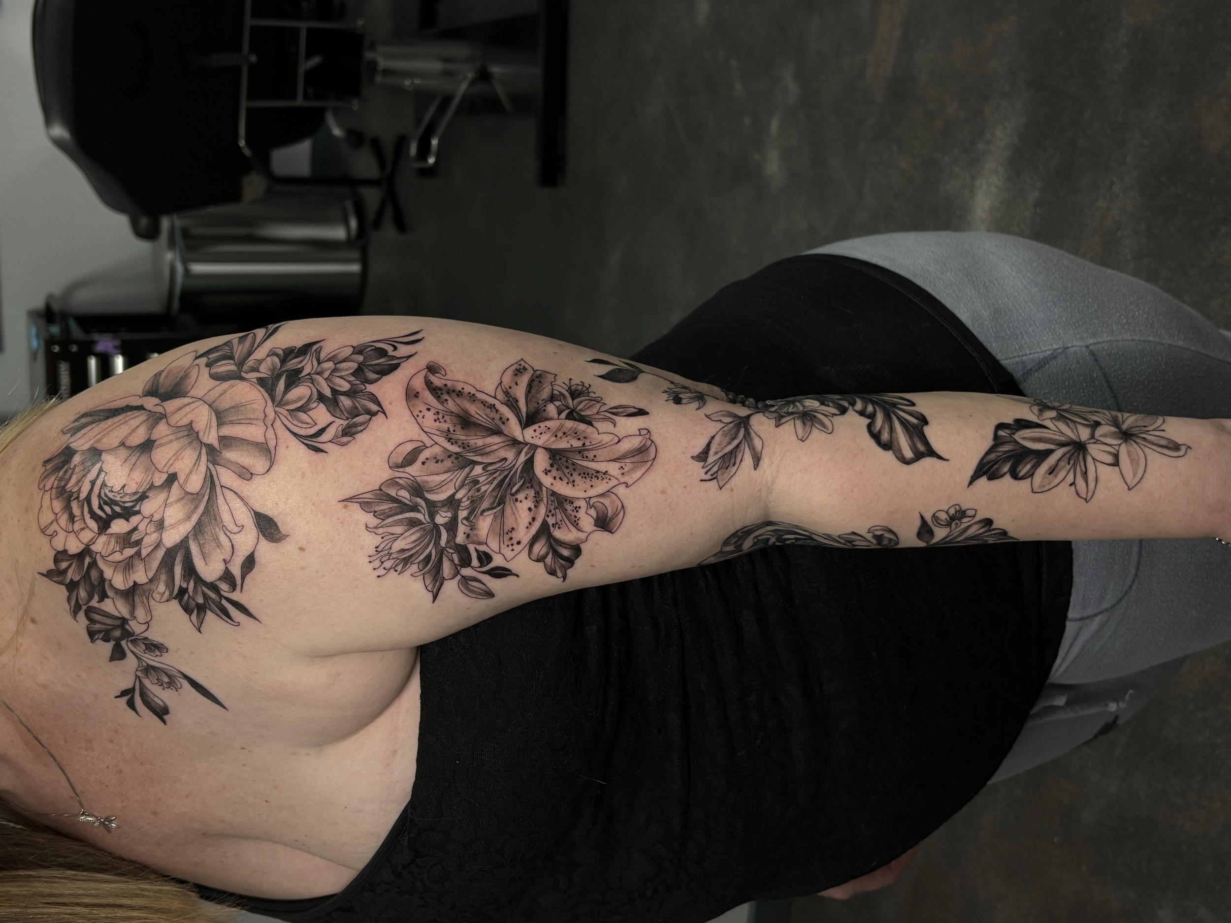 black and gray floral sleeve by Alex Vivian