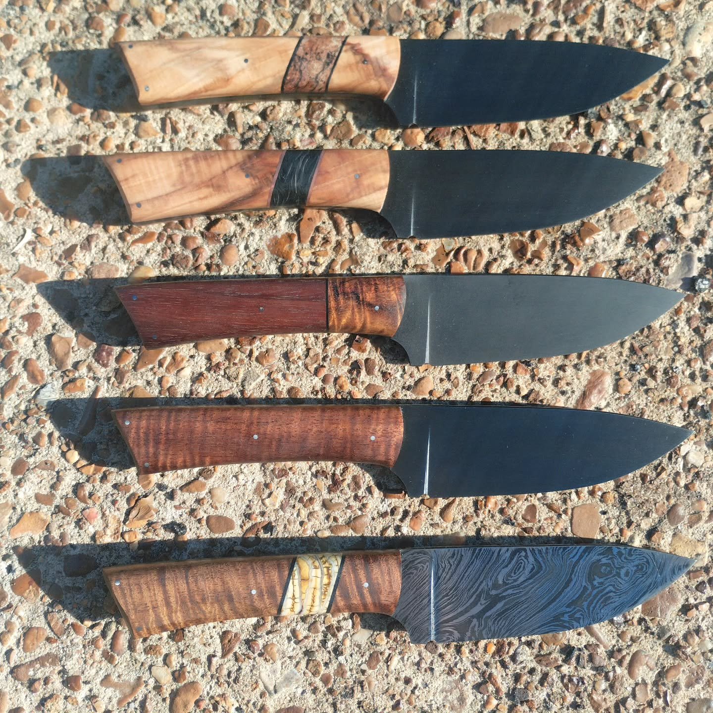 Wrapping these up today.... All are claimed!!! They sure turned out pretty.

#custom #handmade #handle #damascus #mammoth #fossilized #stabilized #wood #steel #hunting #woodsman #craftsmanship #outdoors #outdoorsman