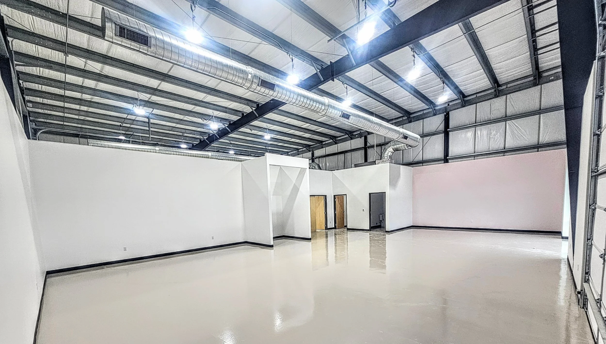 “Modern flex space exterior at CorridorFlex in Central Texas along the I-35 corridor.”