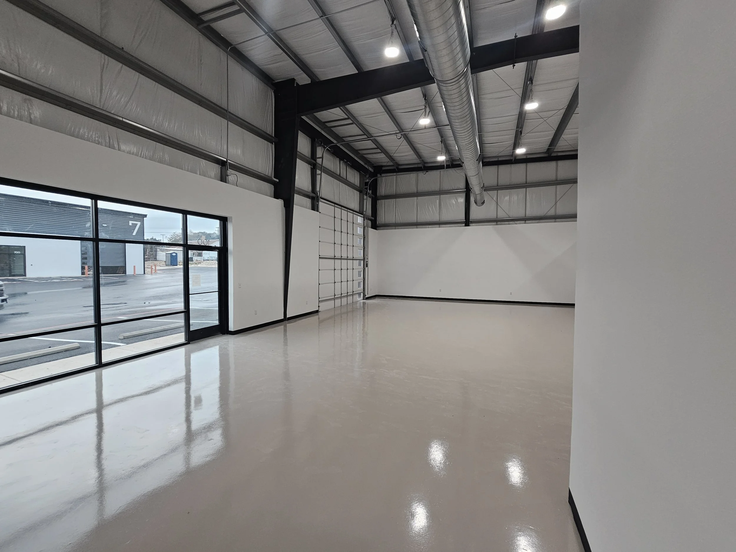 “Modern flex space exterior at CorridorFlex in Central Texas along the I-35 corridor.”