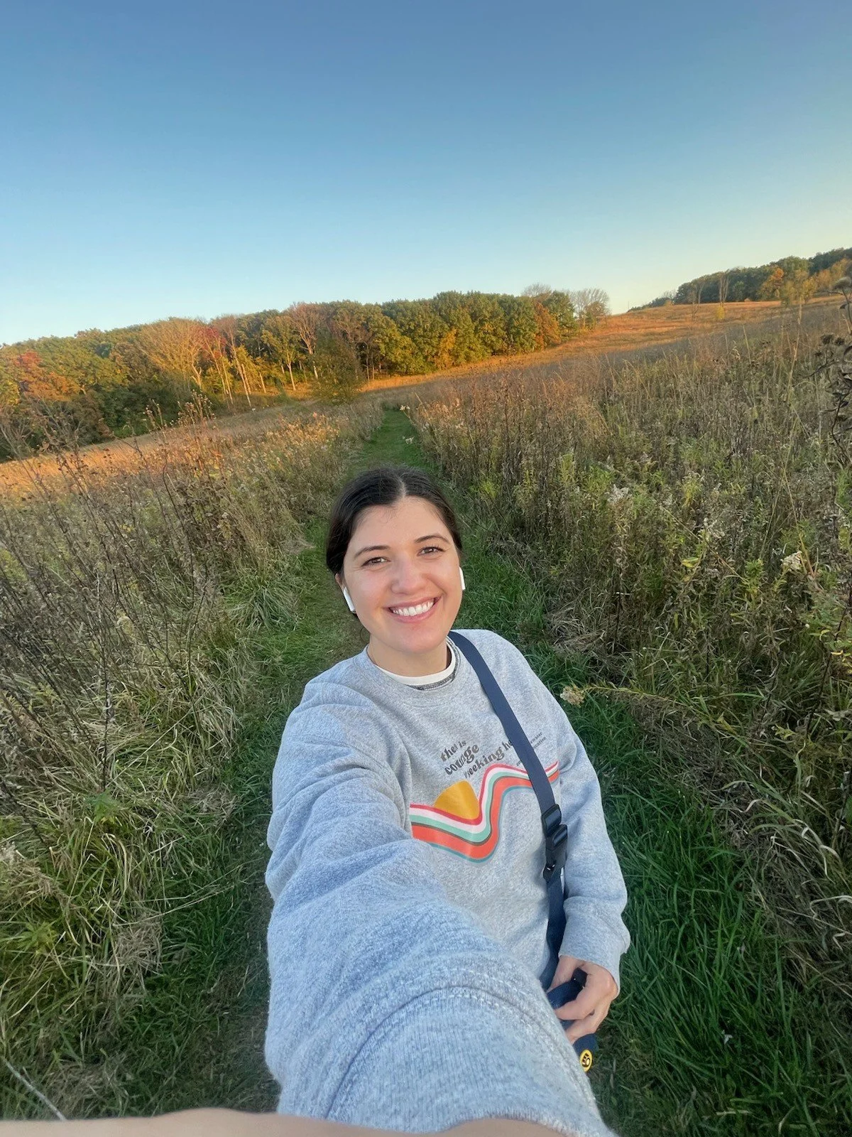 Therapist Kristina Stamm hiking outside