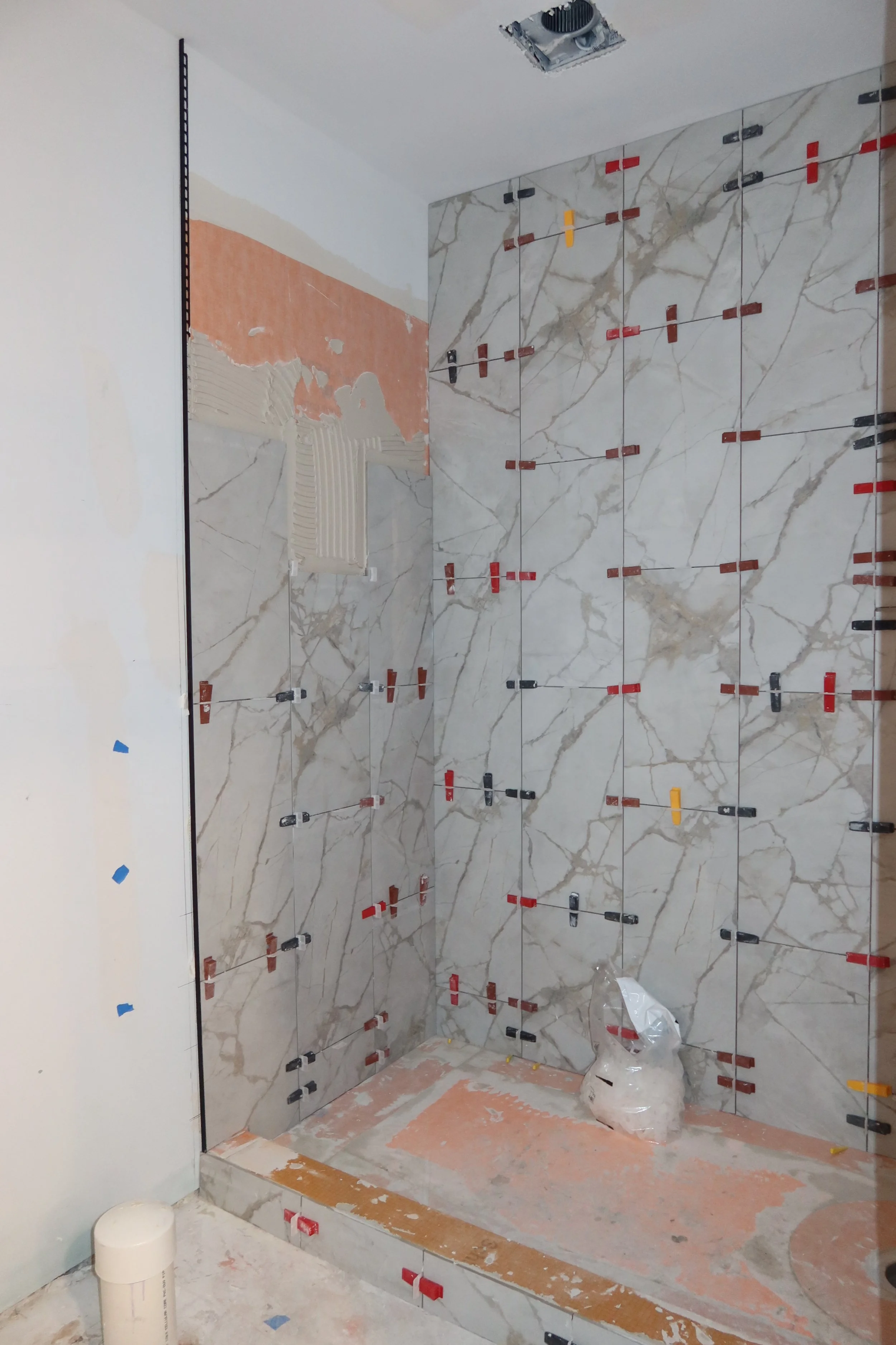 Bathroom renovation with floor-to-ceiling tile work