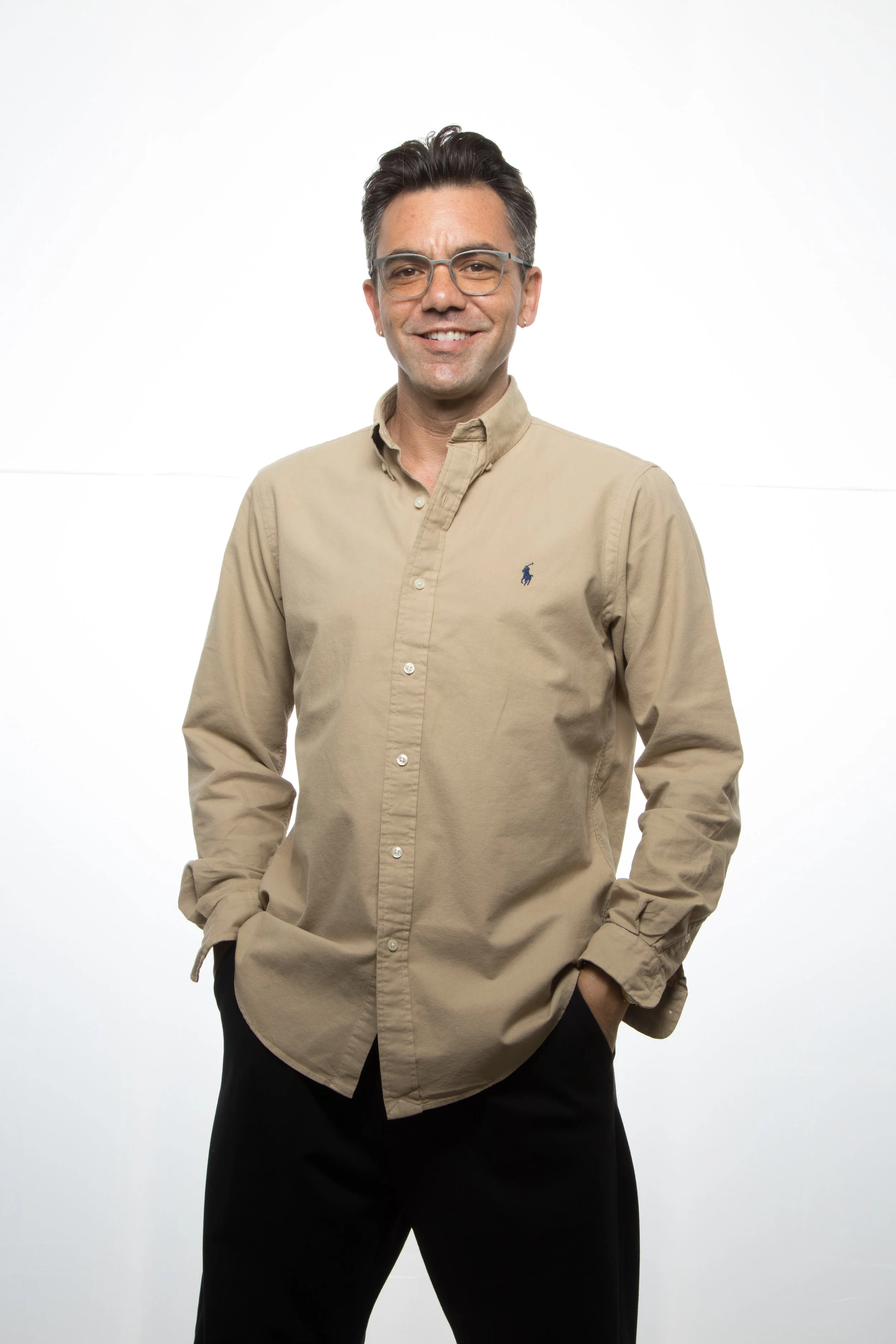 Founder and clinical director of the therapy practice standing against a white background.