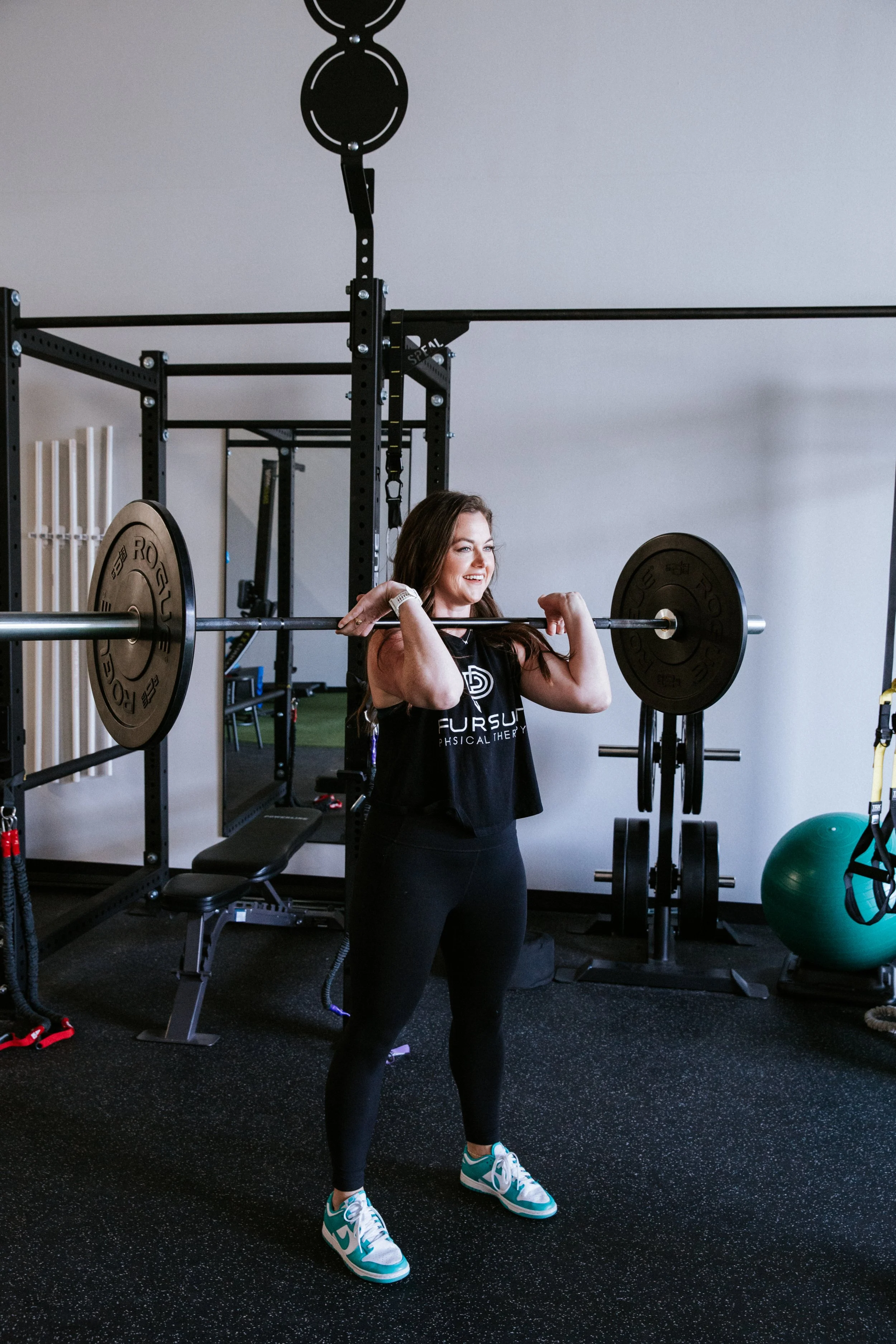 Woman strength training in clinic in Argyle, TX