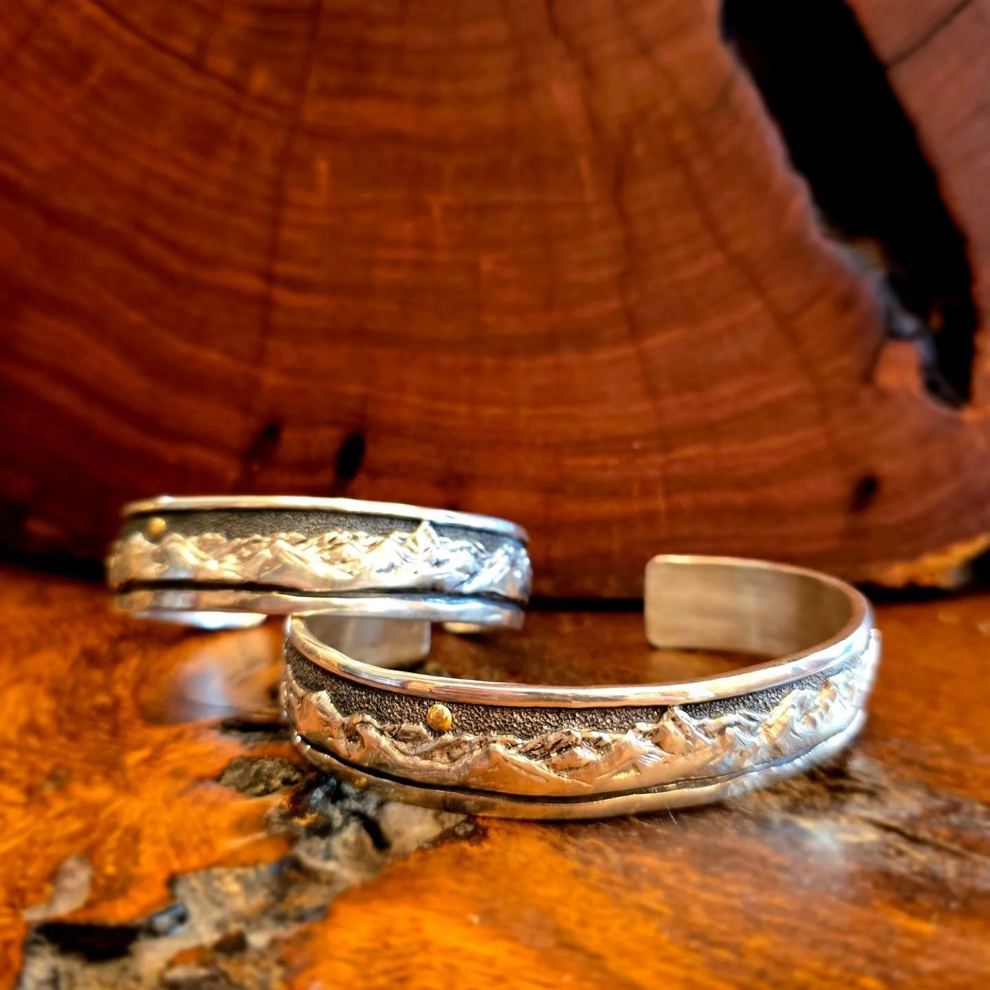 Handcrafted in the heart of the San Juan Mountains, this sterling silver cuff captures the rugged beauty that surrounds Ouray, Colorado. Each mountain peak is carefully carved and polished, reflecting the wild, enduring spirit of the range itself.

M