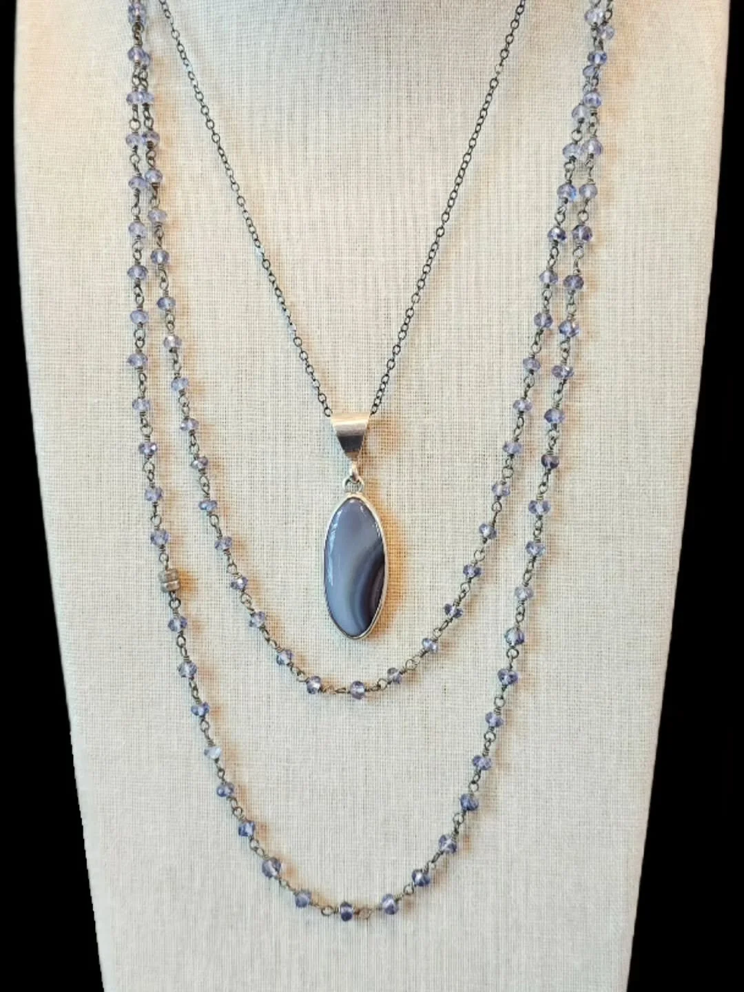 Earthy. Raw. One-of-a-kind.
This stunning Utah Agate is all natural, full of sky tones and banding you can get lost in. Paired with a dark oxidized chain for that perfect contrast&mdash;polished meets rugged, elegance meets edge.

Whether you&rsquo;r