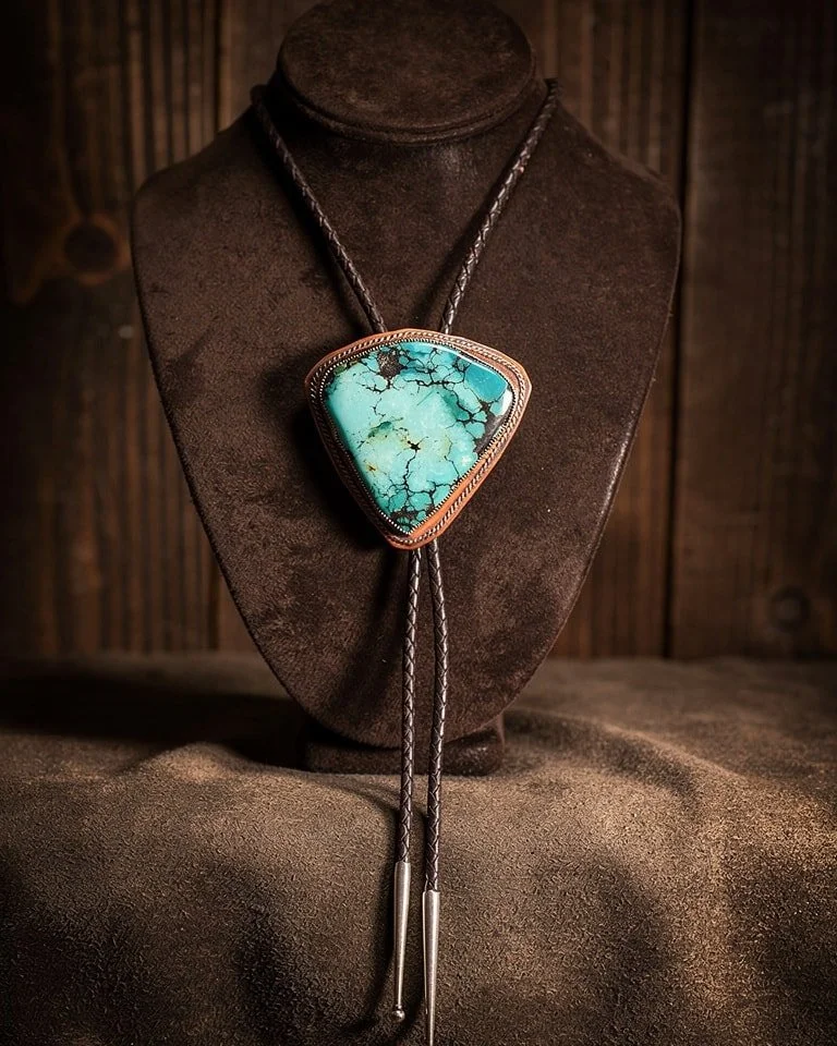 Turquoise that speaks for itself.
This bolo tie brings vintage Western energy with a fresh, modern edge. Dress it up, dress it down&mdash;either way, it stands out.

#TheShaggyCoo #shoplocal #SupportSmallBusiness #BoloTie #TurquoiseStyle #WesternInsp