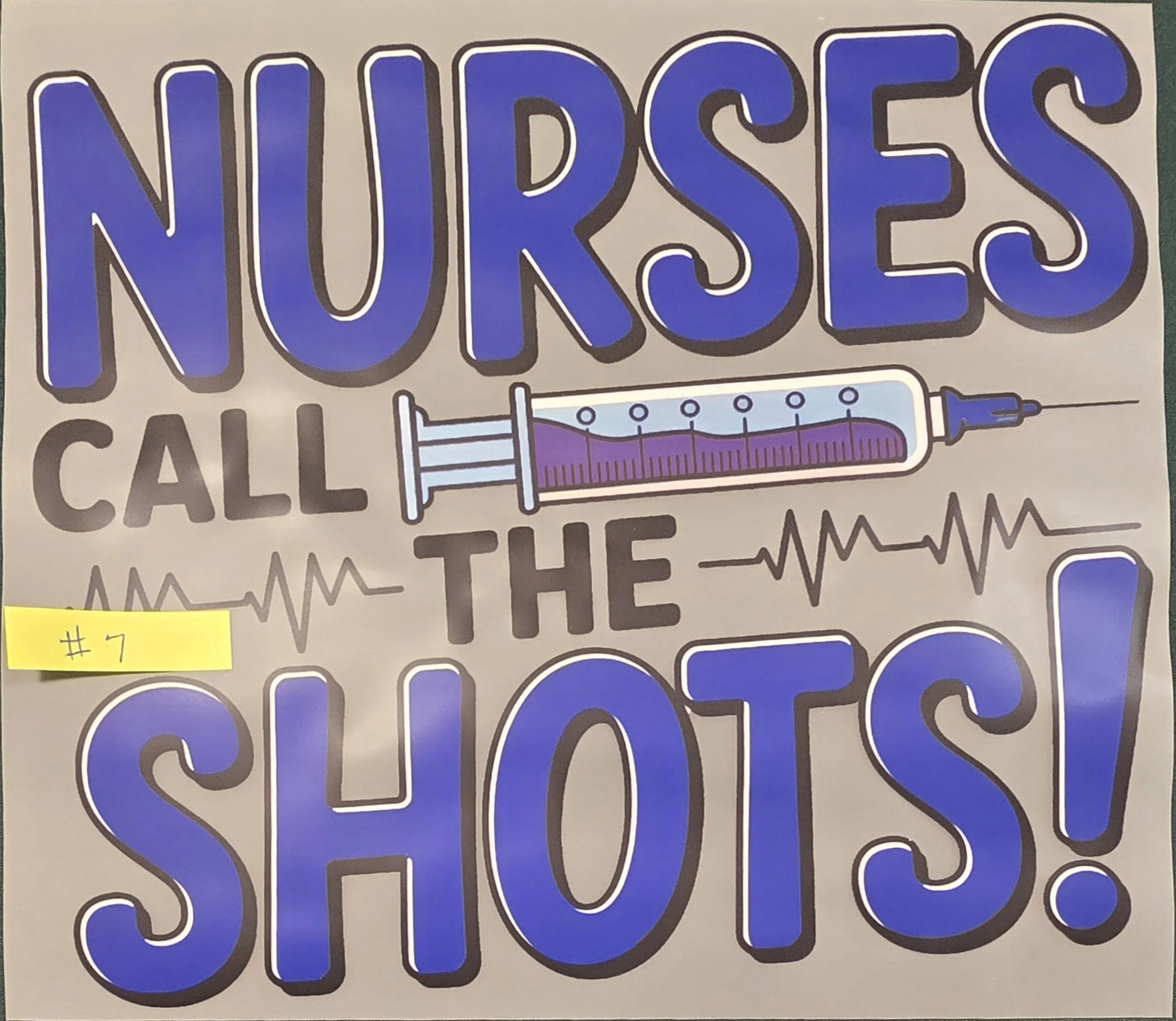 Sign with the word 'NURSES' in large blue letters and an illustration of a syringe below.