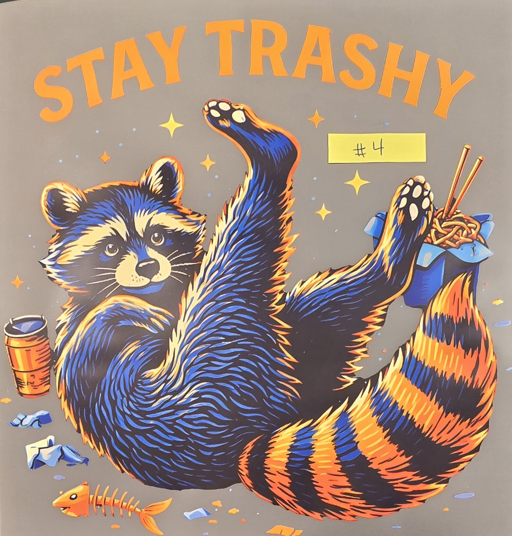 Colorful illustration of a raccoon with a partially eaten pizza, some scattered crumpled papers, a soda can, and a sign that reads '#4', with the words 'STAY TRASHY' in orange letters at the top.