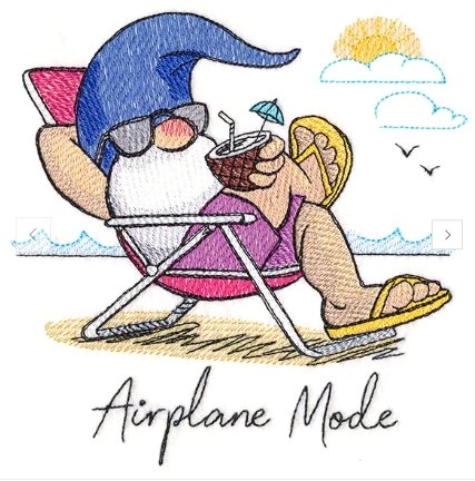 A cartoon gnome with a blue hat and sunglasses relaxing on a pink lounge chair at the beach, drinking a tropical beverage through a straw, with a sun, clouds, and seagulls in the background. The text reads "Airplane Mode."