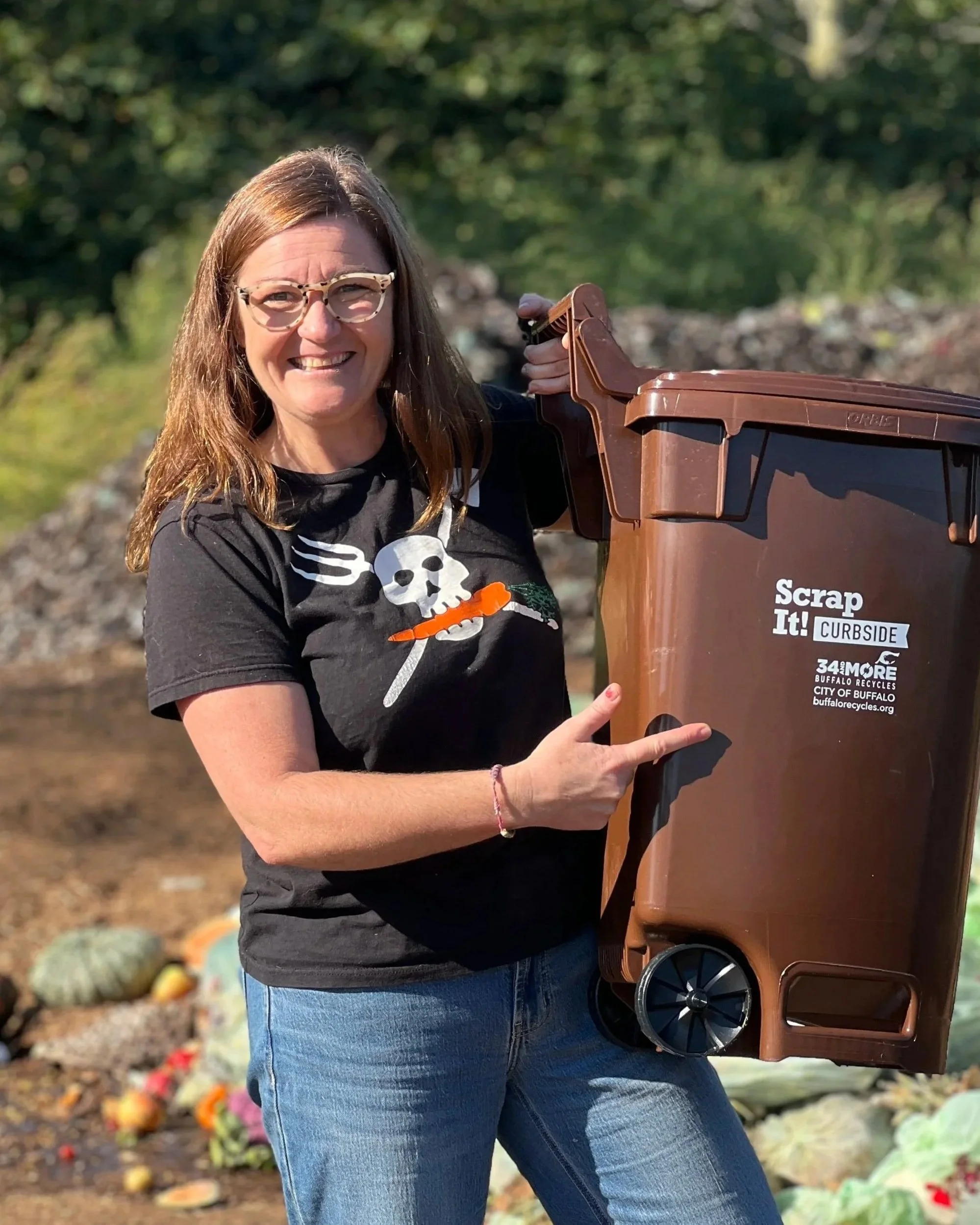 Terra pointing at Scrap It! Curbside Tote