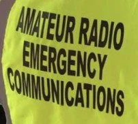 High-visibility safety vest with text 'Amateur Radio Emergency Communications'.