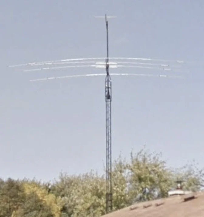A 45-foot ham radio tower with 6-meter and 2-meter beam antennas with rotator.