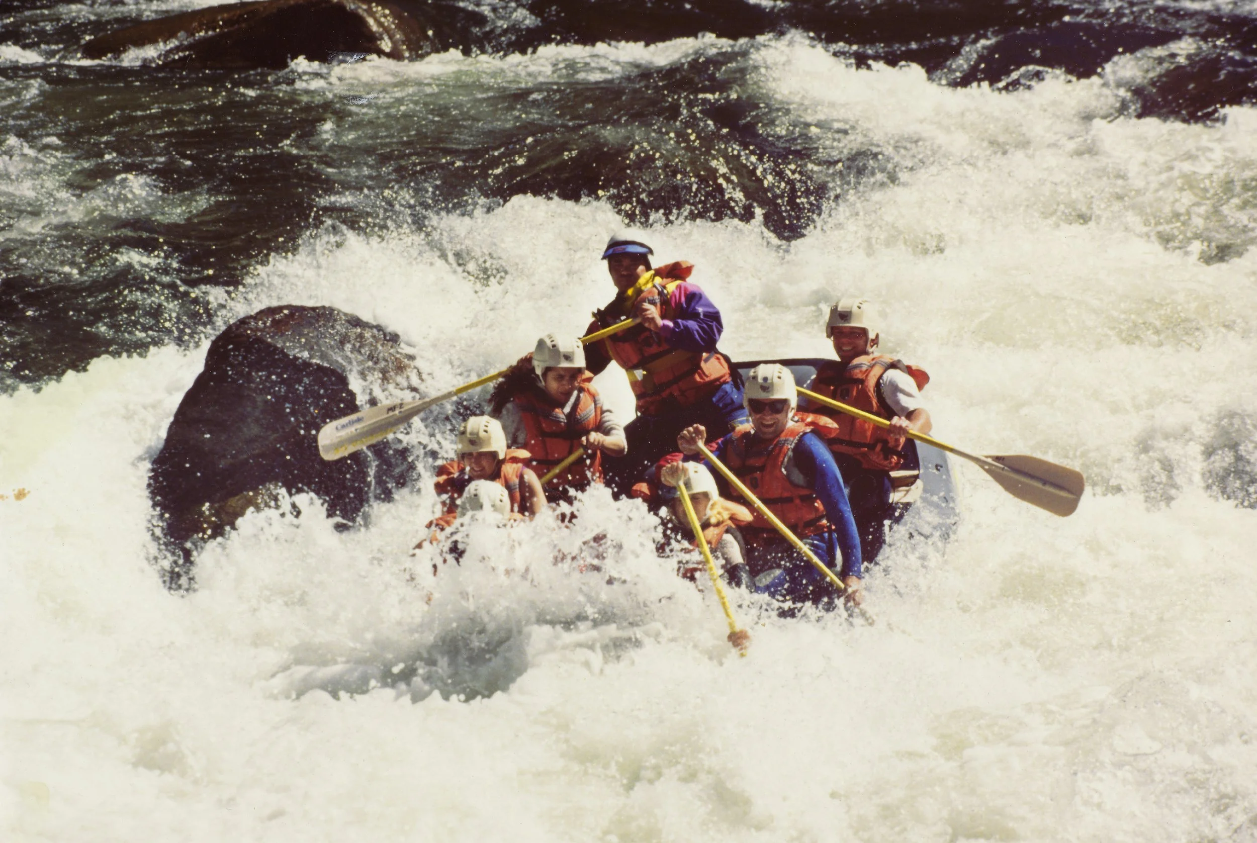 Amir, his wife and friends white water rafting Stage 4+ rapids.