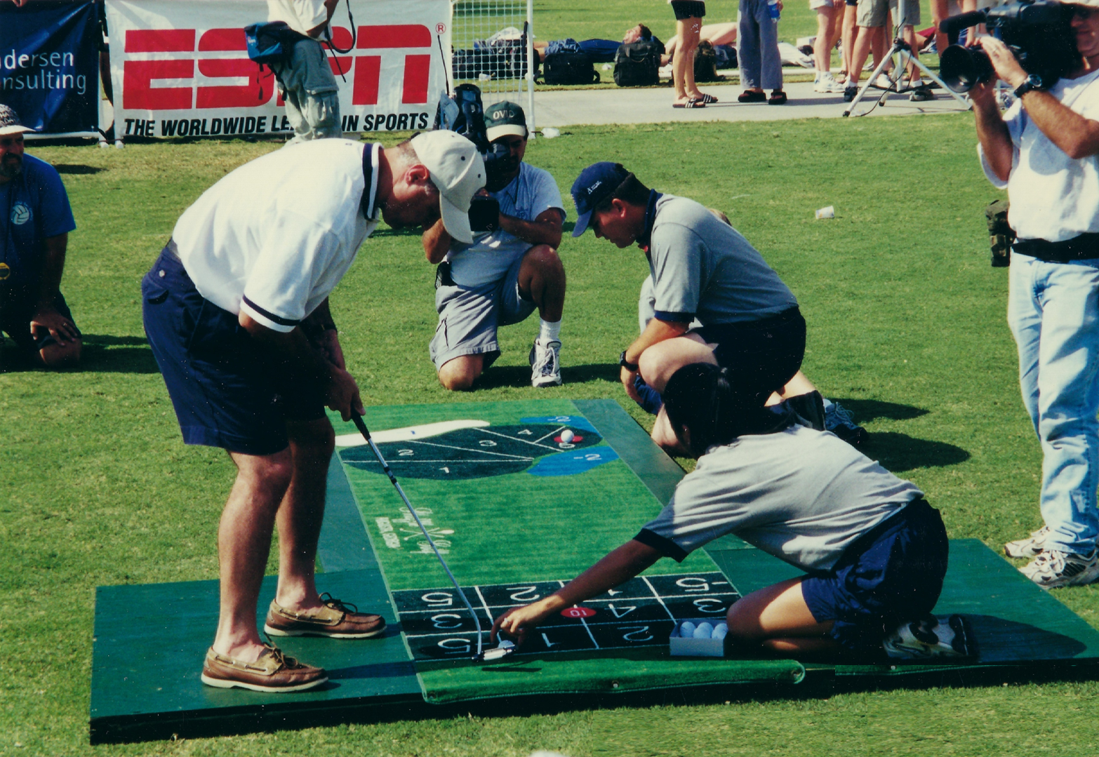 Amir winning Corporate Sports Battle Executive Putting Championship on National ESPN telecast.