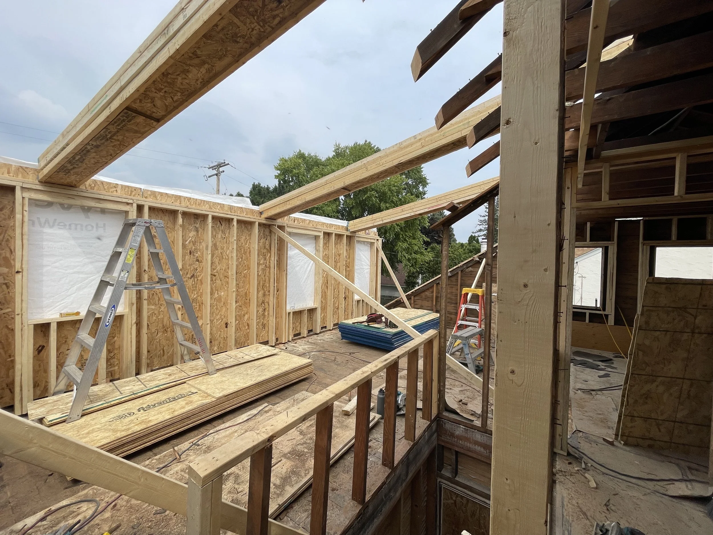 Home addition framing construction in progress for Minneapolis historic home renovation by design-build contractor