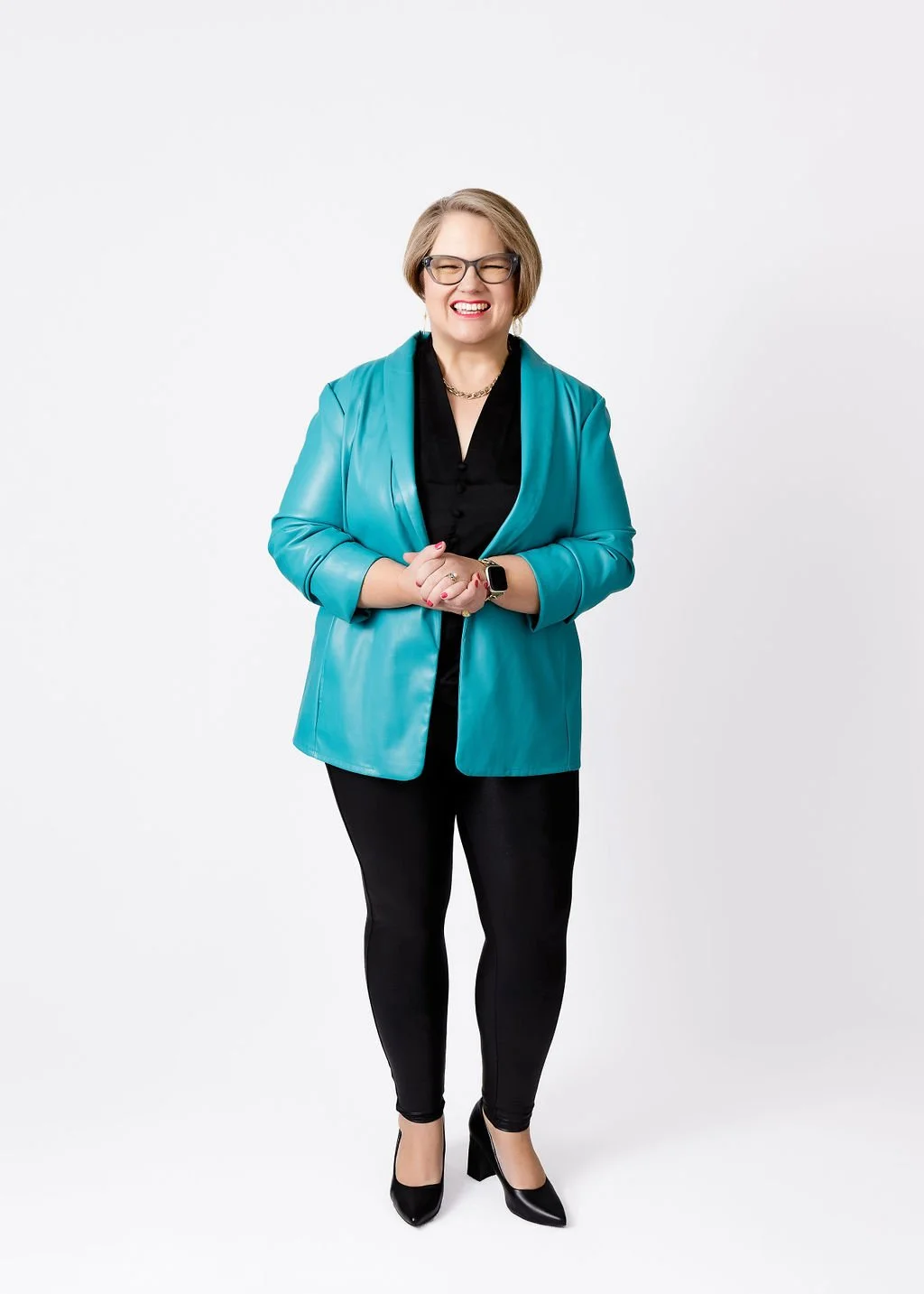 Picture of Carol standing and smiling