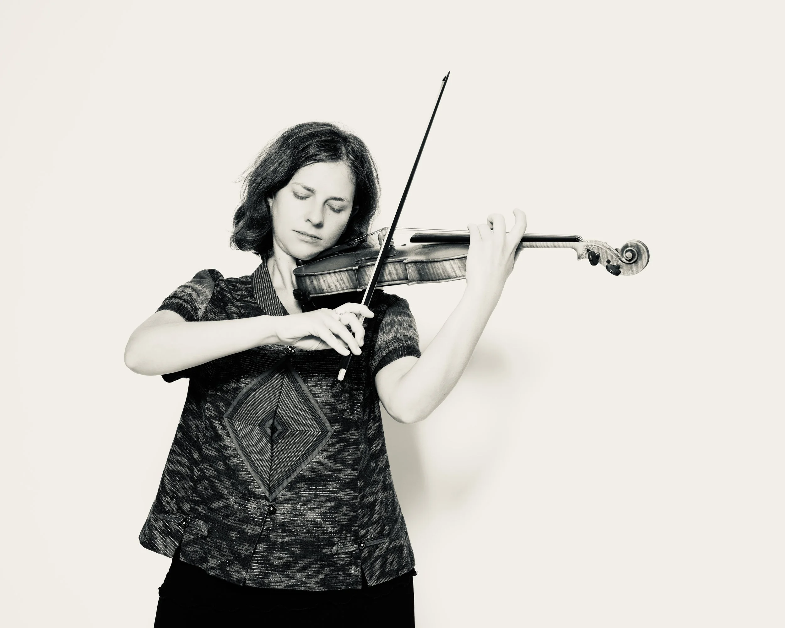 Headshot 2 silvertone.jpg