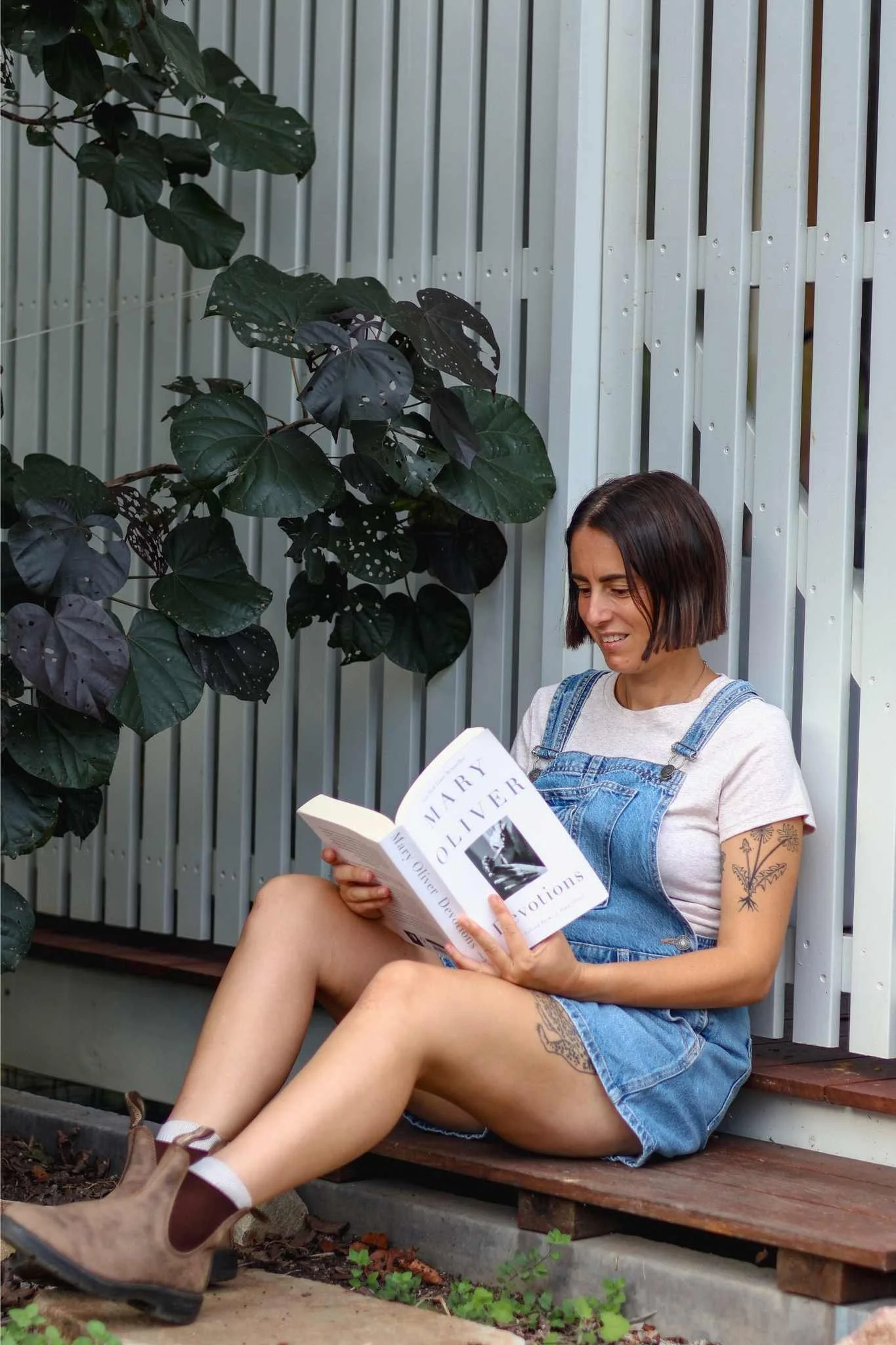 cas reading book on step.jpg