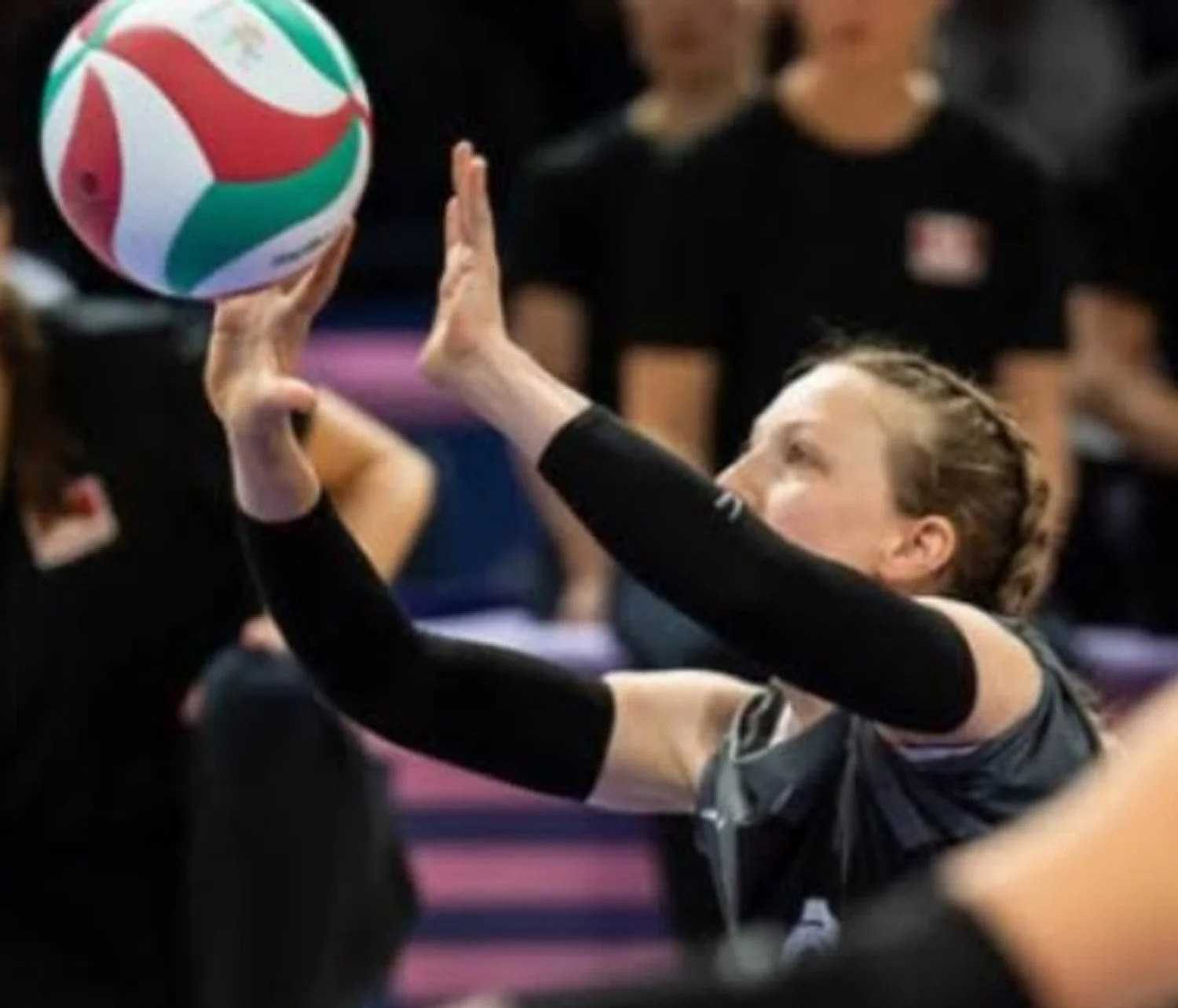Woman doing overhead setting