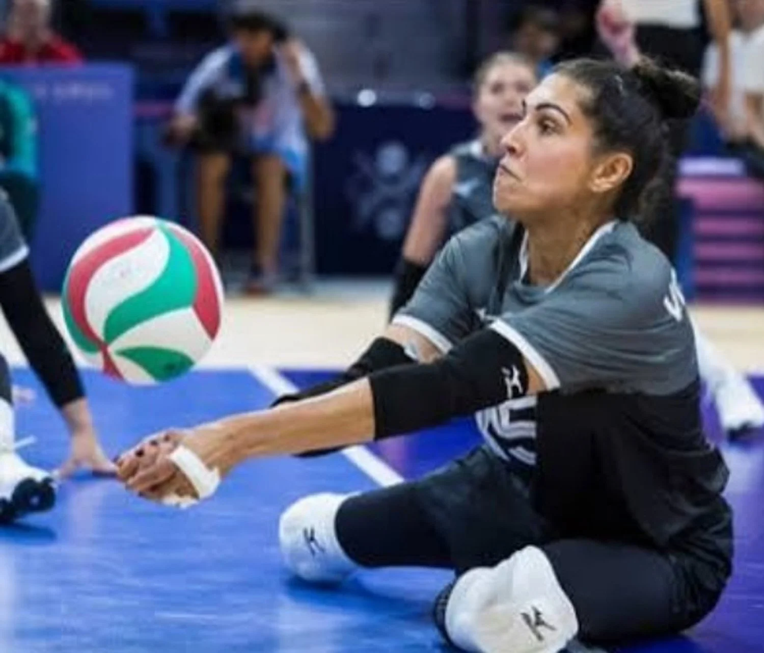 Woman doing a forearm pass