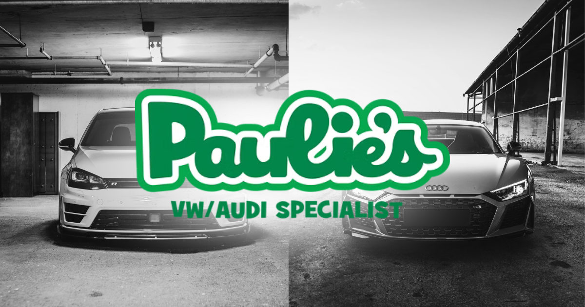 Side-by-side black-and-white photos of two sports cars parked in different industrial settings. The left car is a white hatchback, and the right car is a sleek gray coupe. A green logo for 'Parkies VW/Audi Specialist' overlays the center of the image.