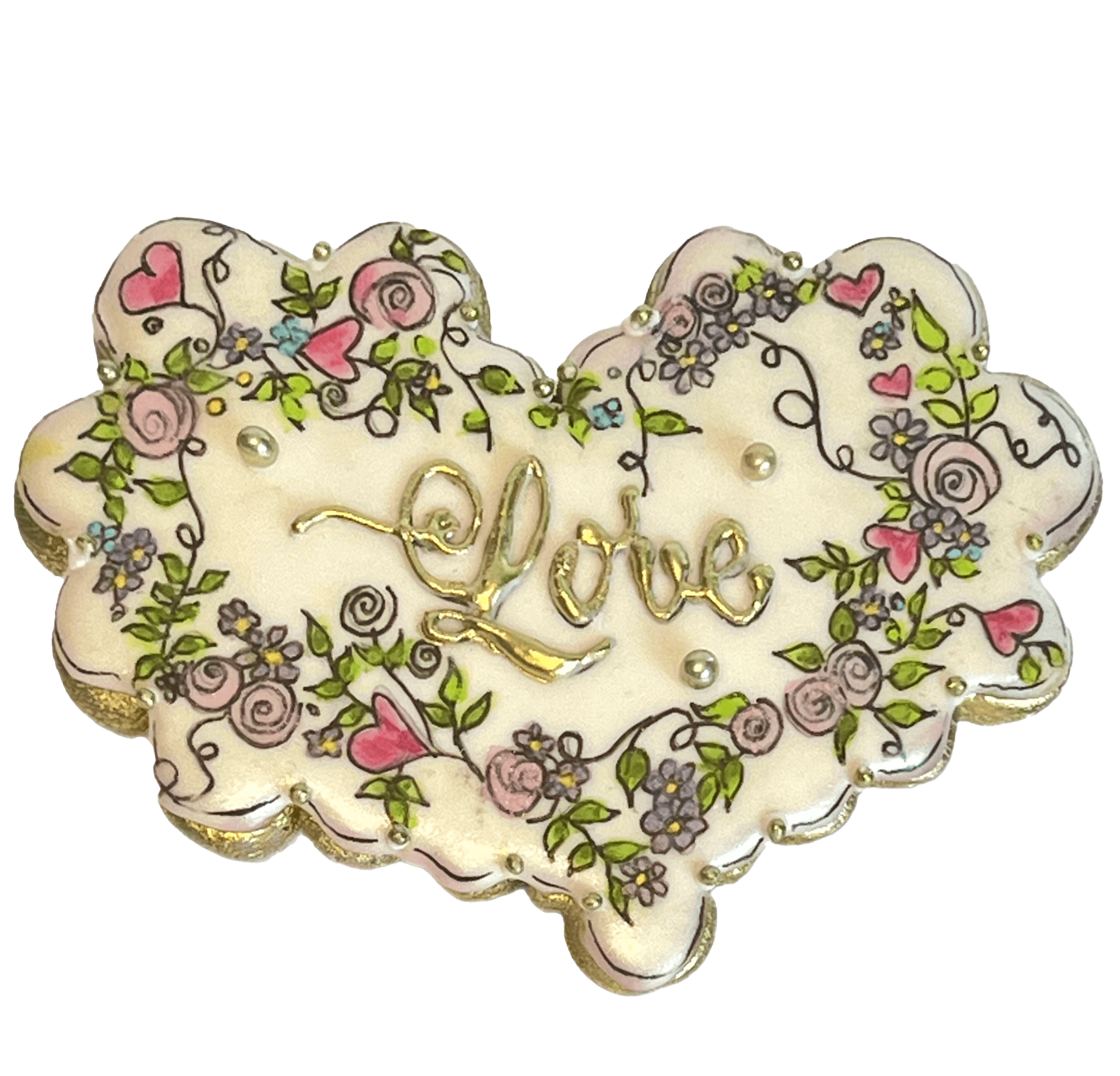 Decorative cookie with "Love" in gold icing, floral and heart patterns.