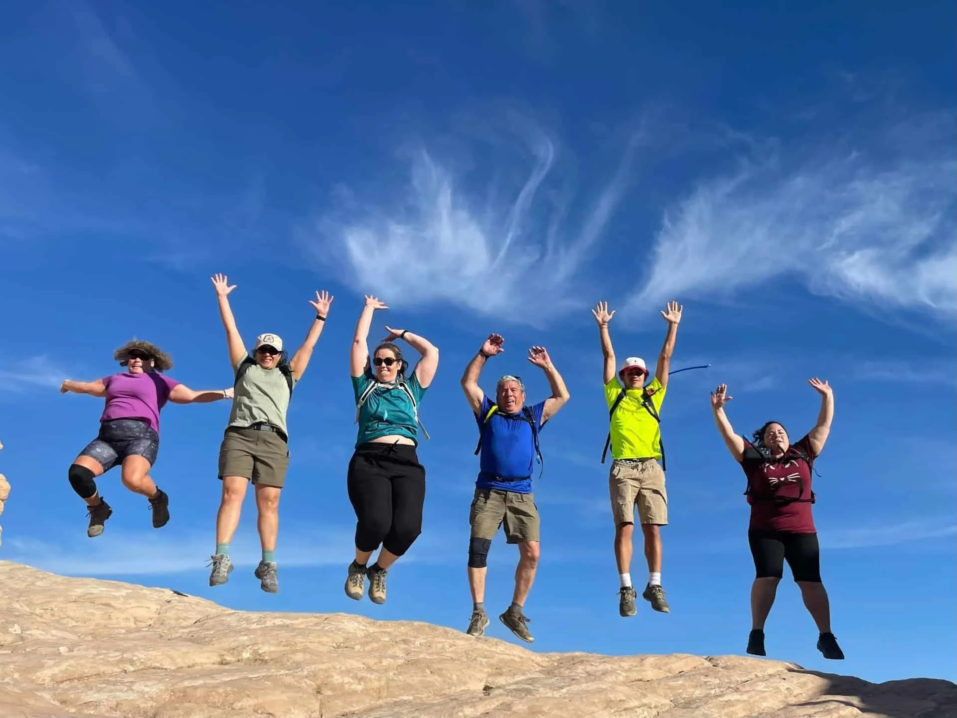 Guests hiking in Snow Canyon at Movara weight loss retreat in Southern Utah