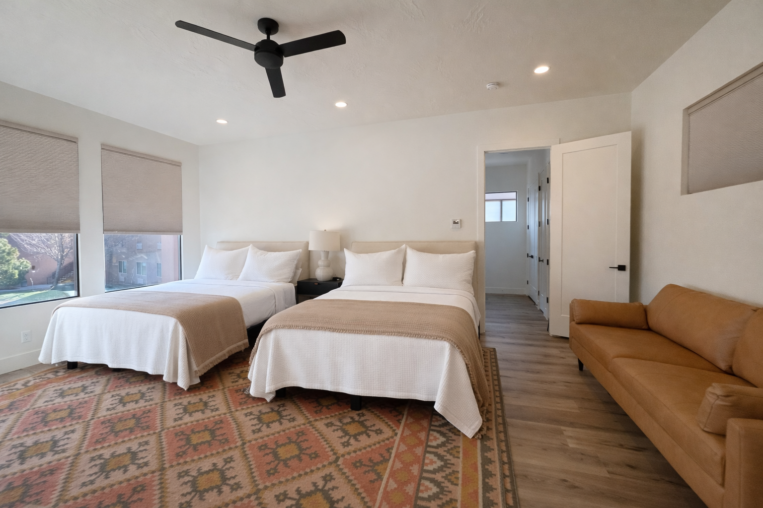 Spacious and cozy hotel room.png