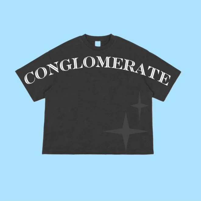 Black T-shirt with 'CONGLOMERATE' text and star designs on a blue background.