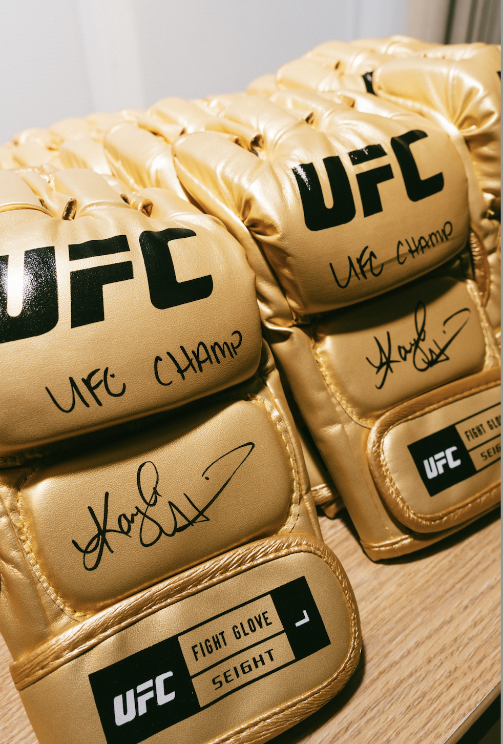 KAYLA HARRISON AUTOGRAPHED GOLD GLOVE "UFC CHAMP" INSCRIBED (PSA)