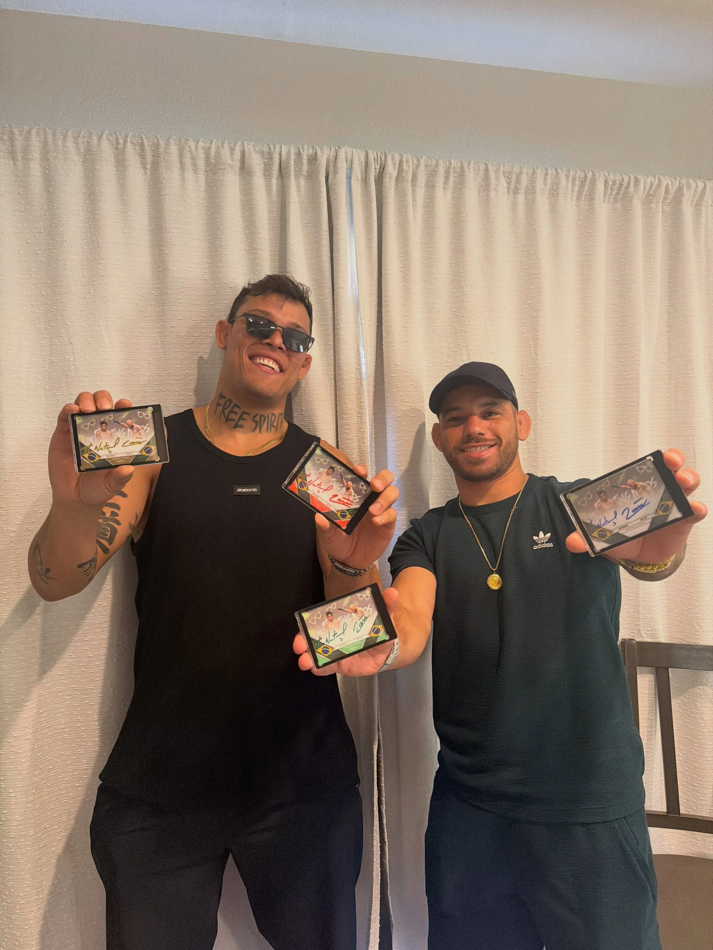 FIGHTING NERDS &times; CHAMPIONS COLLECTION 🤓🇧🇷

Limited edition cards dual-signed by Caio Borralho and Jean Silva.

It was awesome having both Caio and Jean join us live on our Whatnot stream together to sign cards and gloves!

Limited cards avai