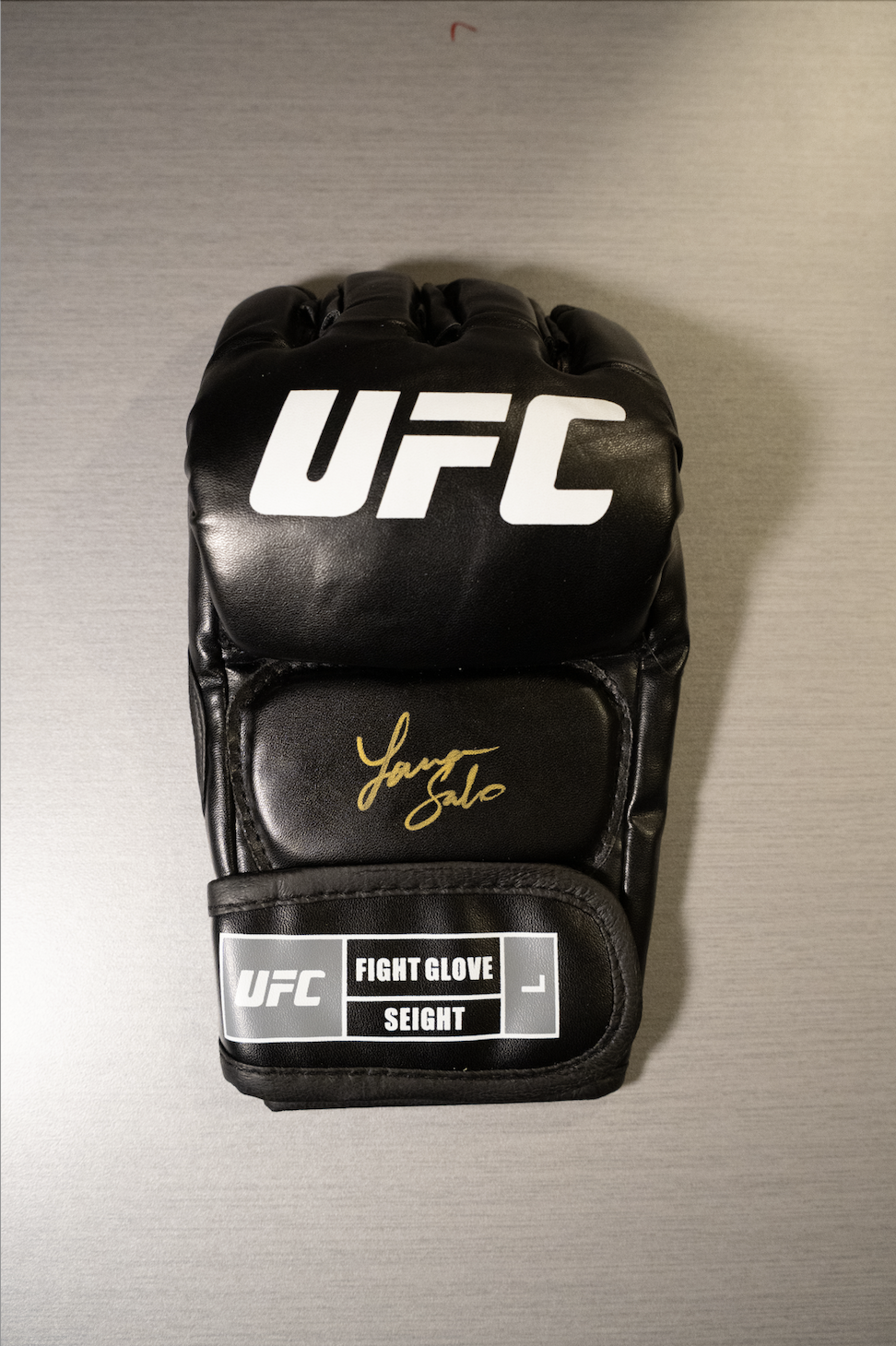 LAURA SANKO AUTOGRAPHED GLOVE BLACK (PSA)
