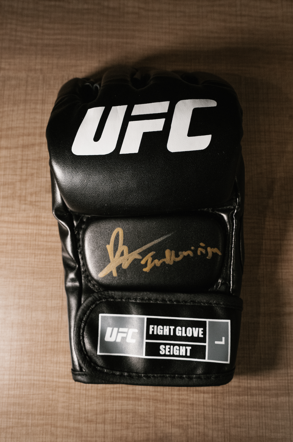 BILAL HASAN AUTOGRAPHED GLOVE INSCRIBED "INDONINJA" (PSA WITNESSED)