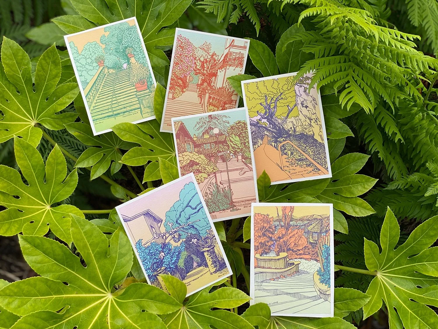 six postcards of colorful art of Berkeley's Beaux-Arts public paths, Bernard Maybeck's Rose Walk, and some rustic paths like Indian Rock Path within a leafy green backdrop