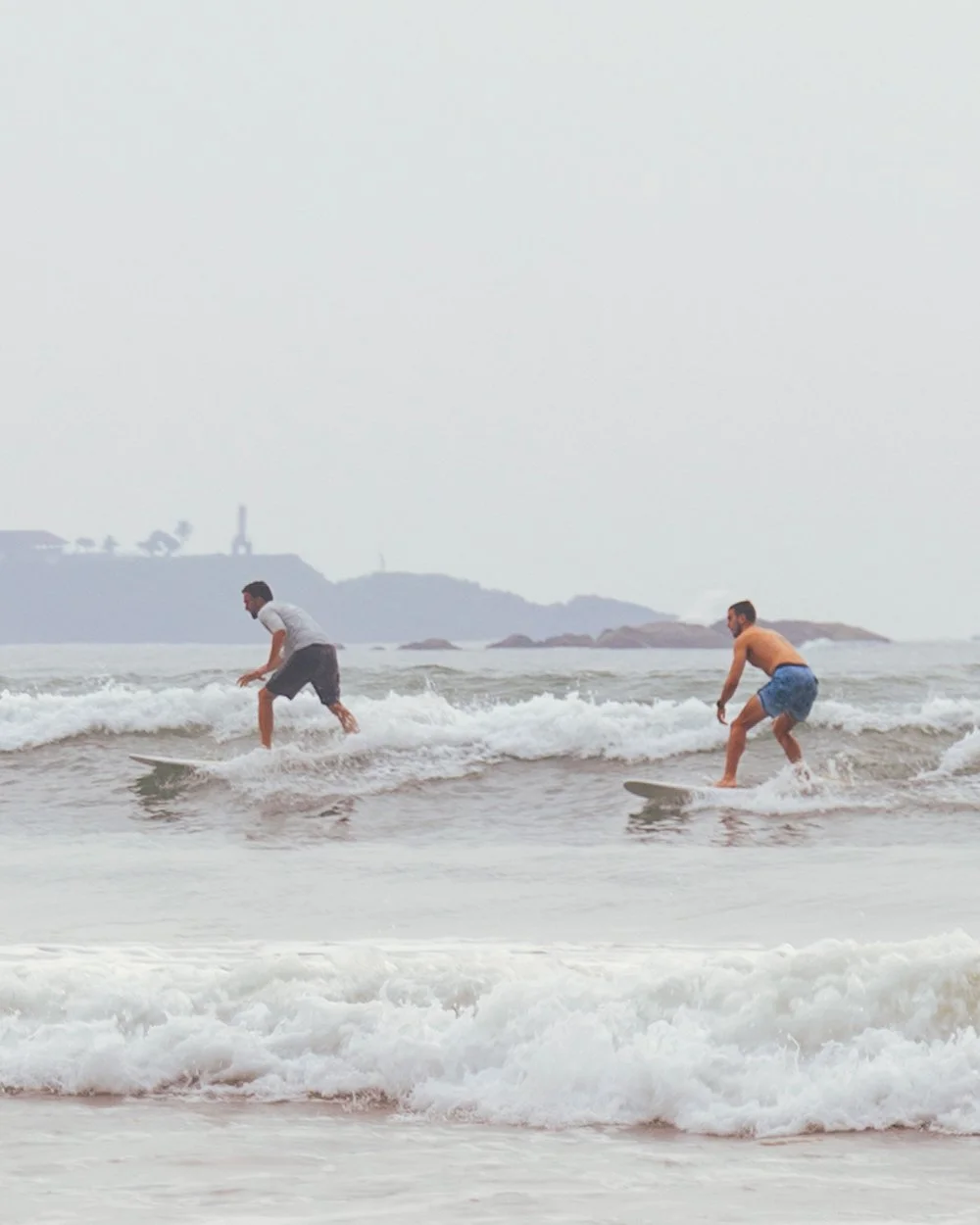Surfers in Weligama